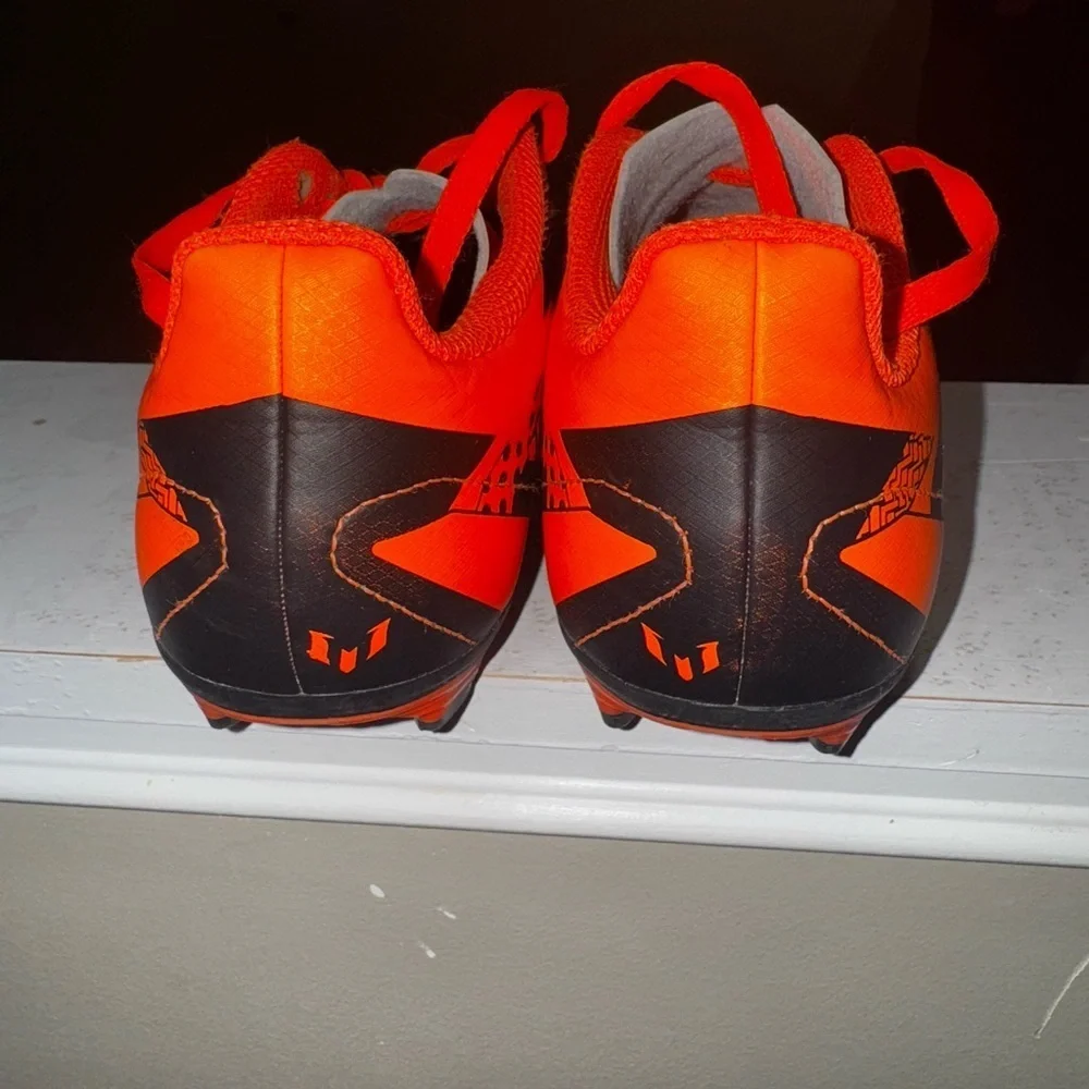 Adidas Orange and Black Cleats